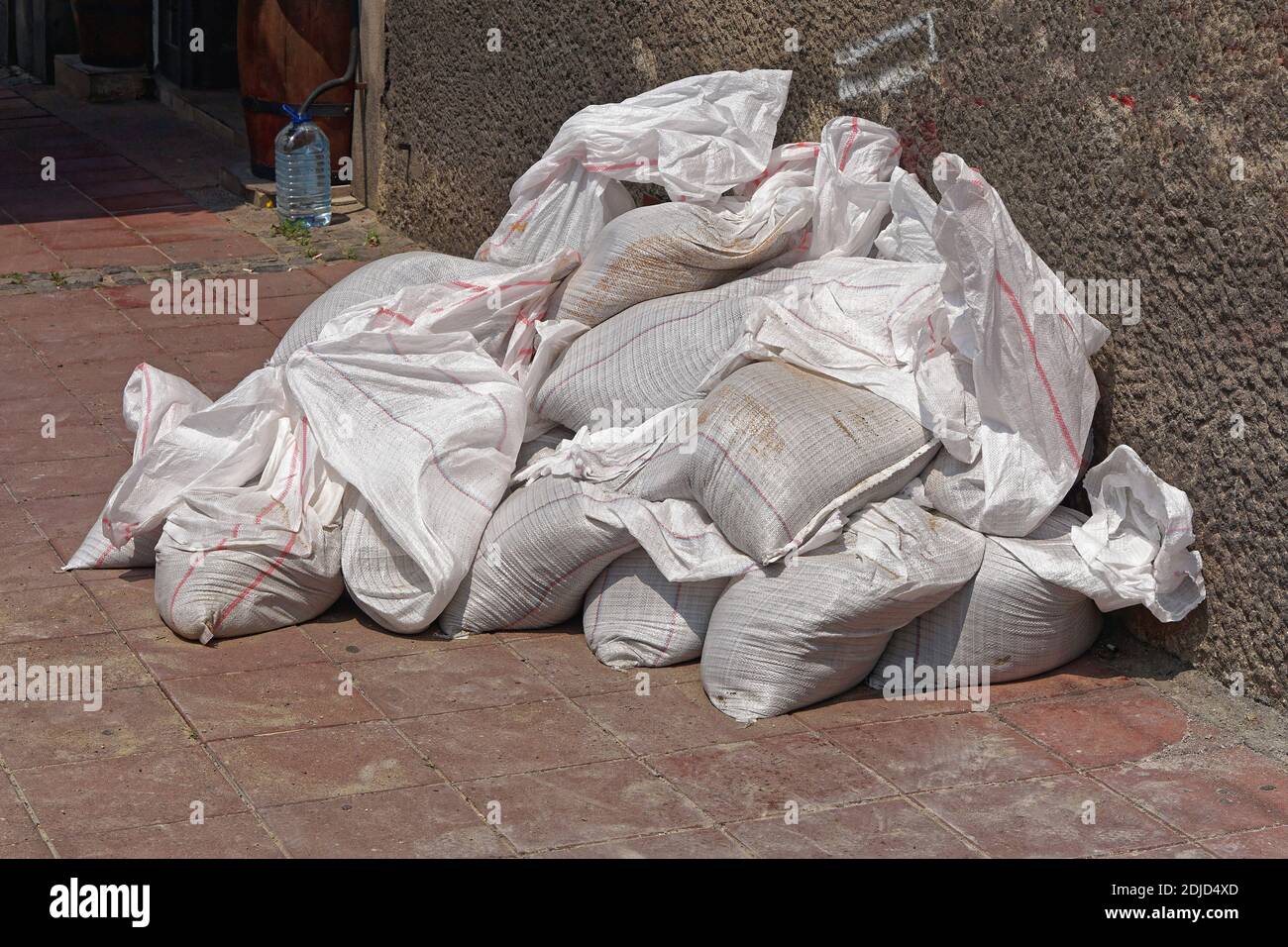 Many white garbage bags full of construction waste Stock Photo Alamy