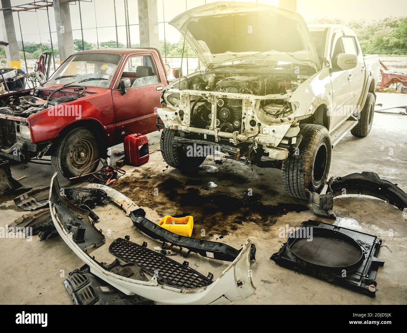 Damaged Cars In Garage Stock Photo Alamy