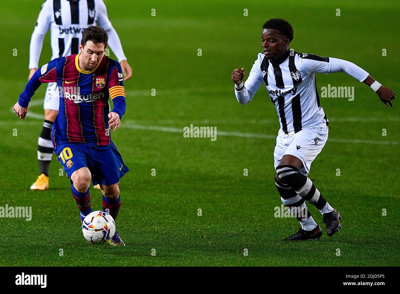 BARCELONA, SPAIN - DECEMBER 13: Lionel Messi of FC Barcelona, Mickael ...
