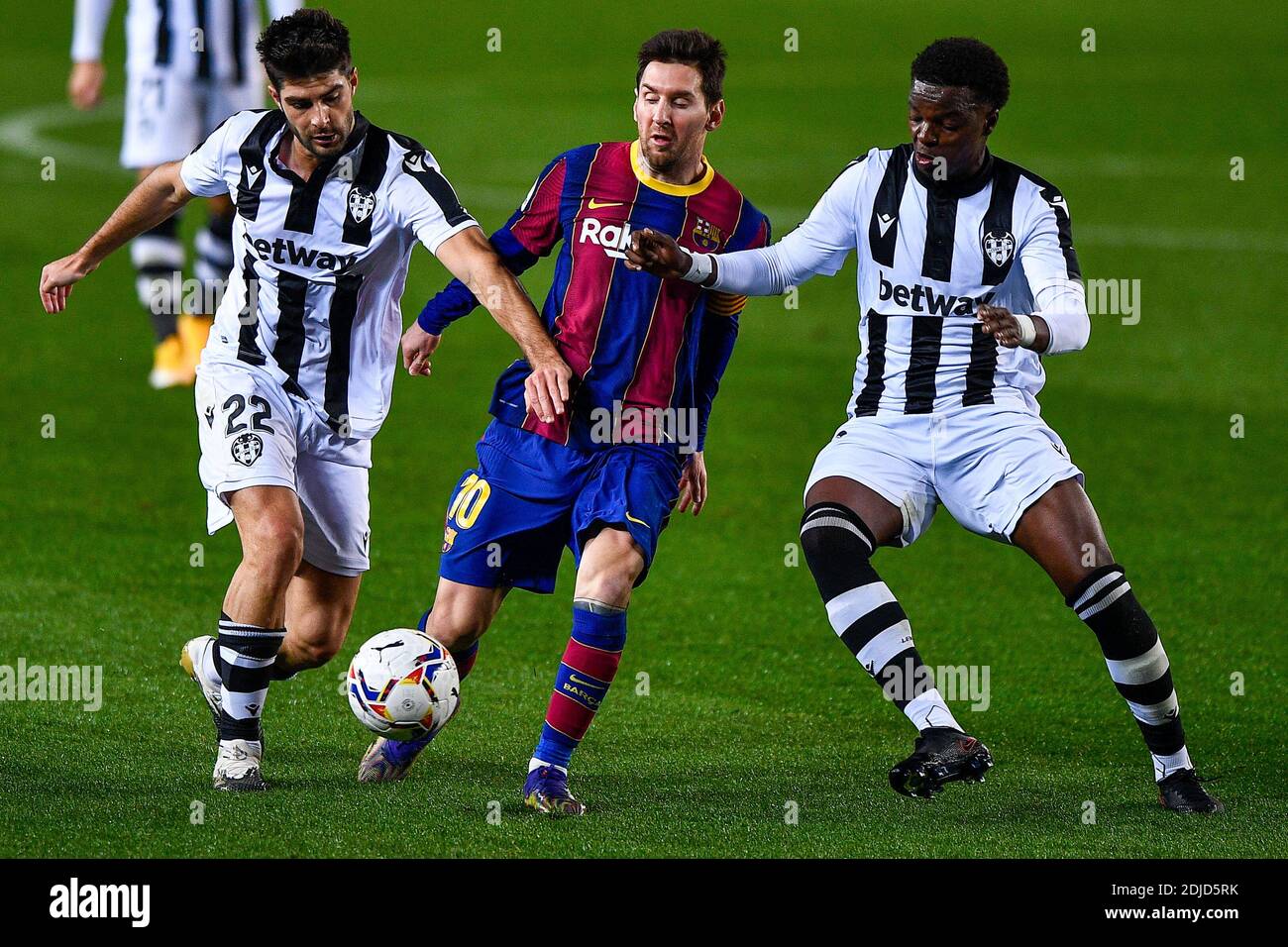 BARCELONA, SPAIN - DECEMBER 13: Melero of Levante, Lionel Messi of FC ...