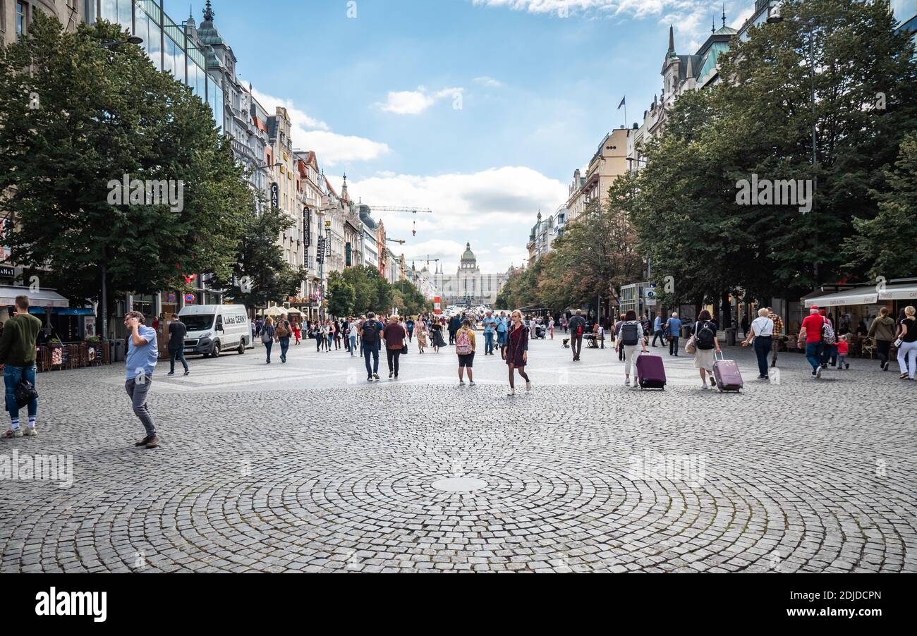 Wenceslas Square, Prague, Czech Republic. The cobbled streets of the central shopping district with the National Museum visible in the distance. Stock Photo