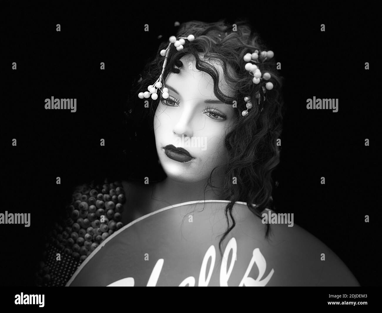 Mannequin With Wig Against Black Background Stock Photo - Alamy