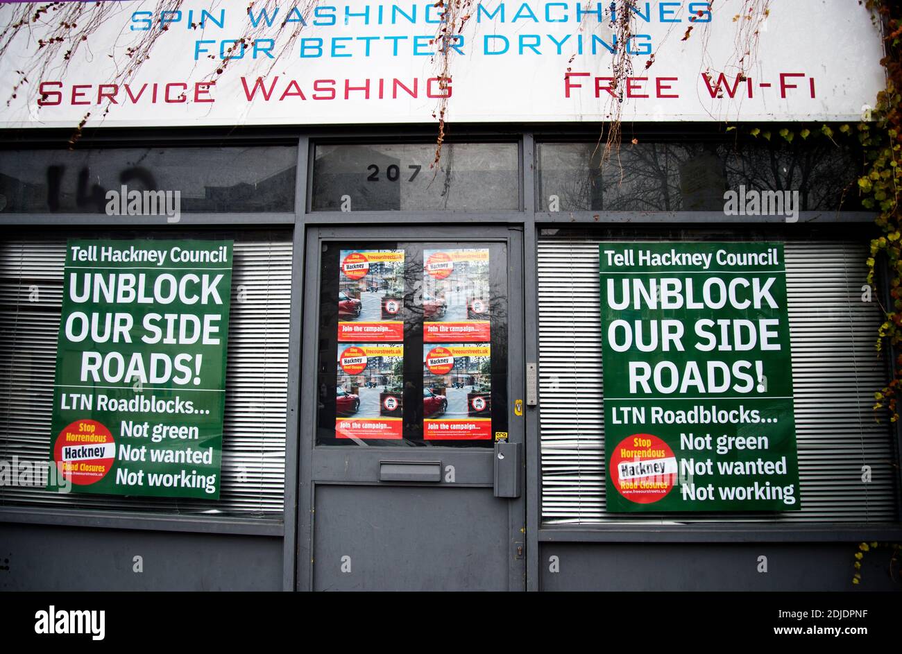 London December 2020. Hackney Road. Posters urging the council to change its traffic policy of blocking some roads to traffic. Stock Photo
