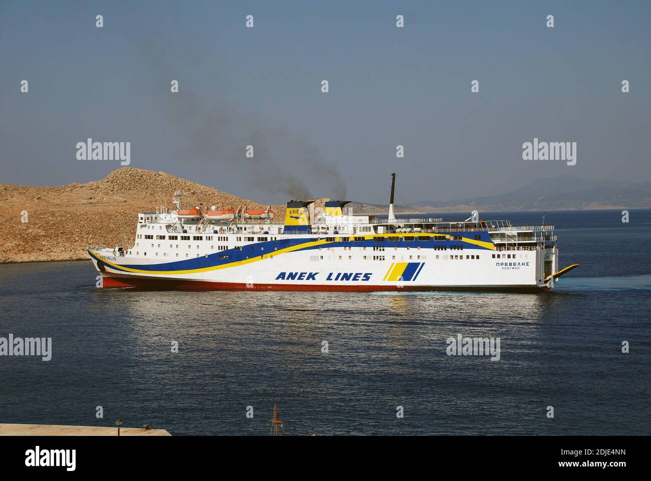 ANEK Lines ferry boat Prevelis arrives at Emborio harbour on the Greek island of Halki on July 19, 2016. Stock Photo