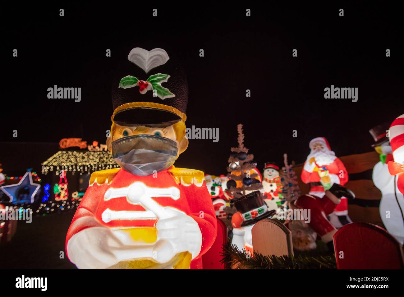 A drummer with a mask is on guard. During the Advent season, the garden of the Broeggelhoff family (BrÃ¶ggelhoff) shines and sparkles. Advent on December 12th, 2020 in Lippetal/Germany. Â | usage worldwide Stock Photo