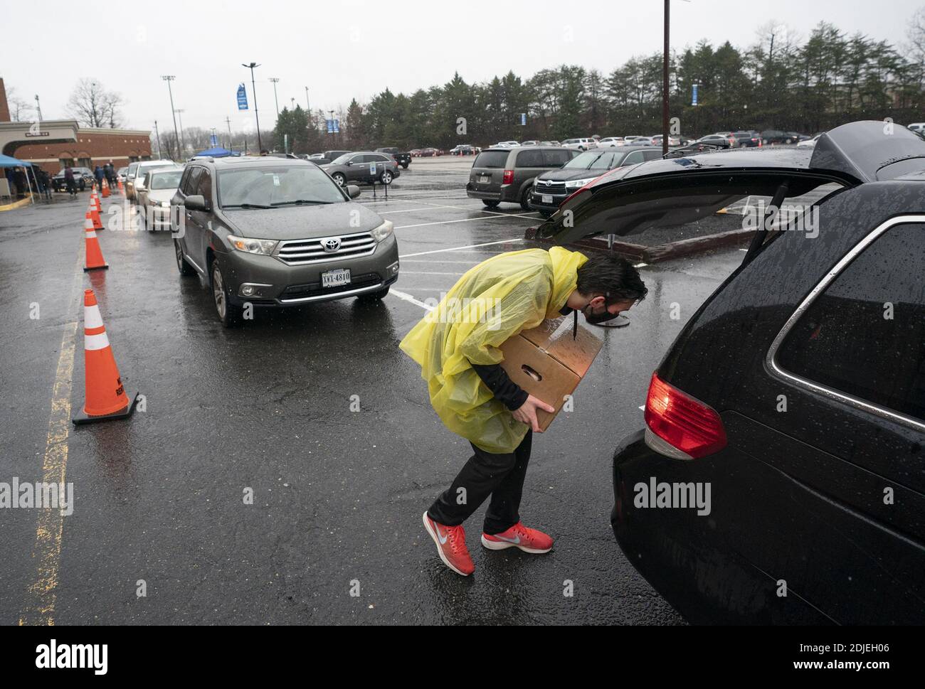Washington, United States. 14th Dec, 2020. Volunteers with the Farmers to Families Food Box Program distribute food to needy individuals at Christ Church in Woodbridge, Virginia on Monday, December 14, 2020. Photo by Kevin Dietsch/UPI. Credit: UPI/Alamy Live News Stock Photo