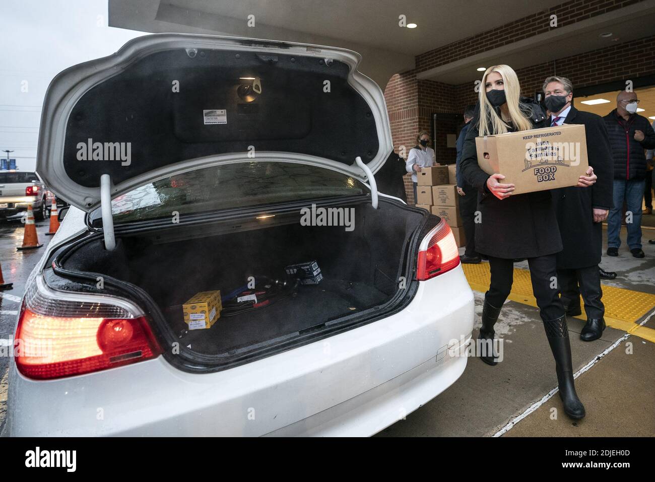 Washington, United States. 14th Dec, 2020. Ivanka Trump, White House advisor and daughter of President Donald Trump, helps to distribute food boxes to needy families at Christ Chapel in Woodbridge, Virginia on Monday, December 14, 2020. Photo by Kevin Dietsch/UPI Credit: UPI/Alamy Live News Stock Photo