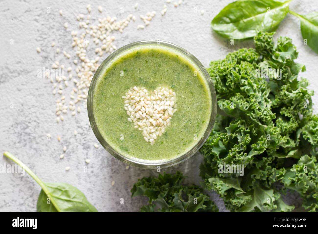 Healthy green smoothie with heart of seeds linseed Stock Photo