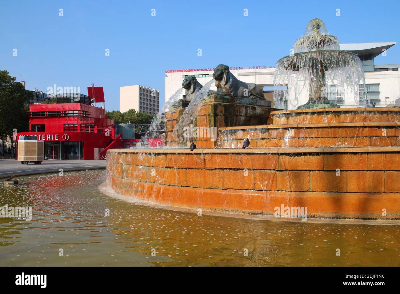 lions fountain at la villette in paris in france Stock Photo