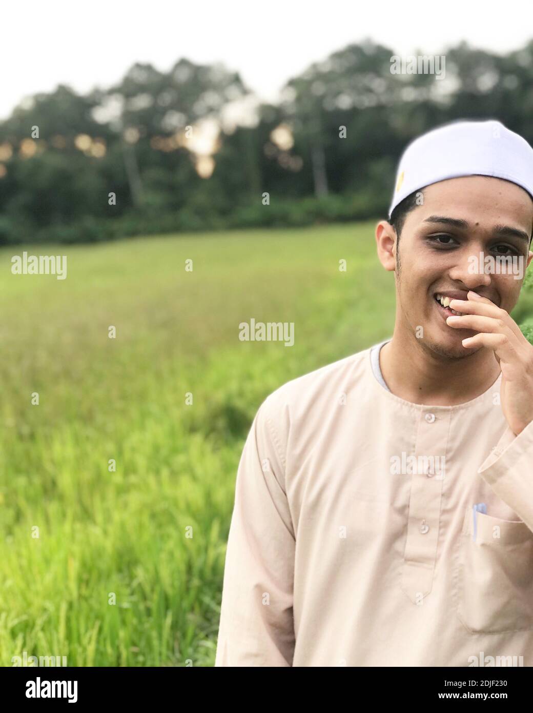 Portrait Of Young Man Wearing Skull Cap 