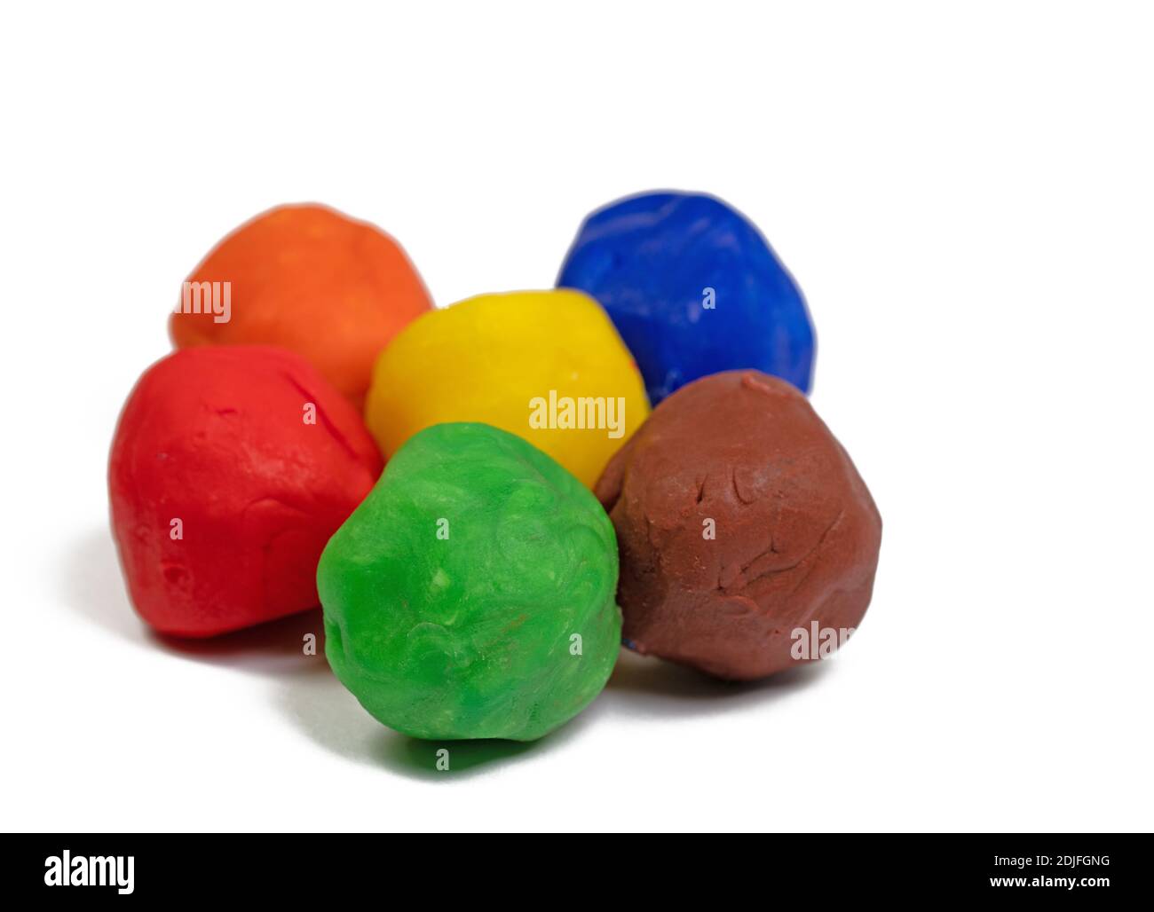Colorful plasticine against a white background Stock Photo