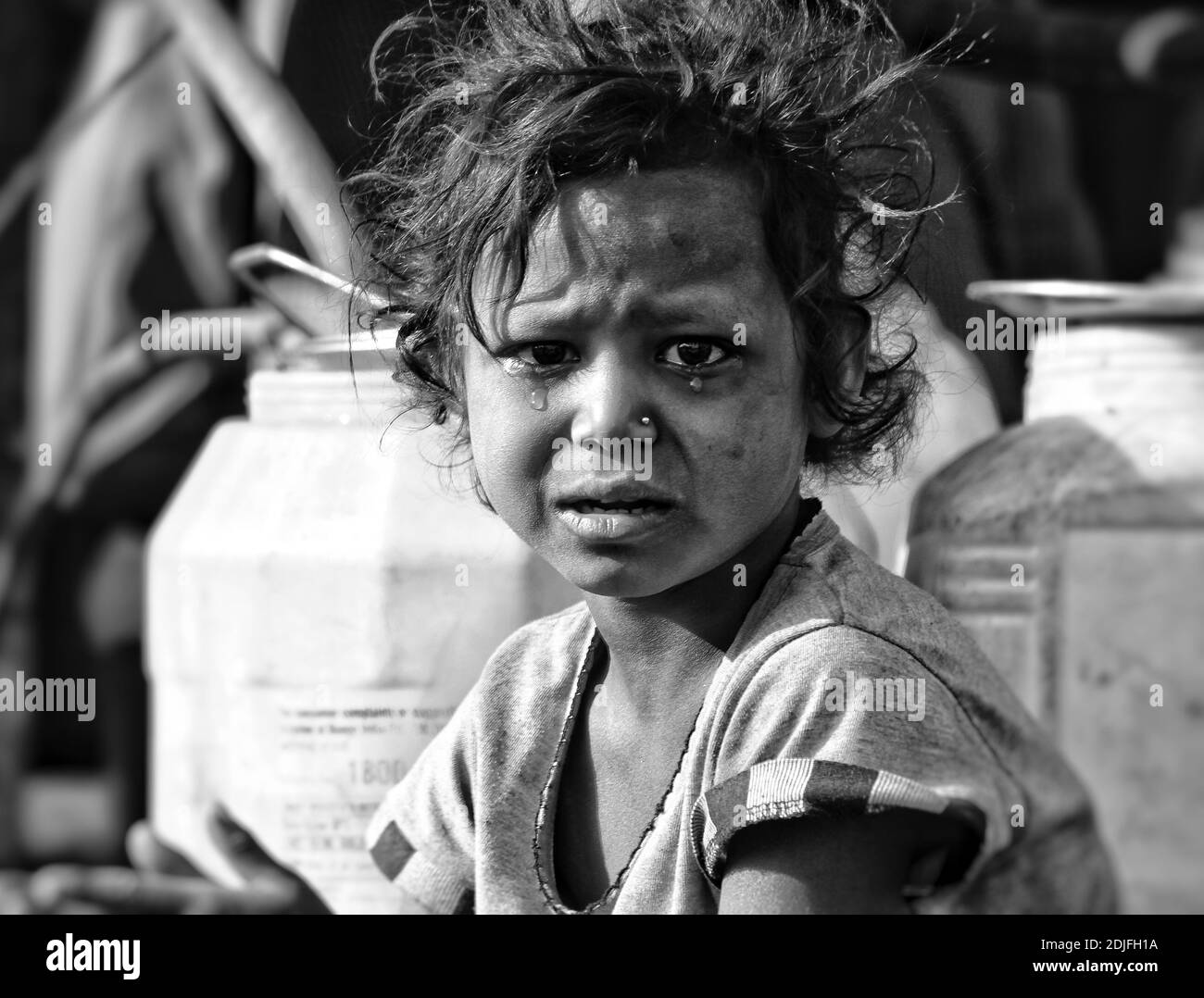 Child crying looking Black and White Stock Photos & Images - Alamy