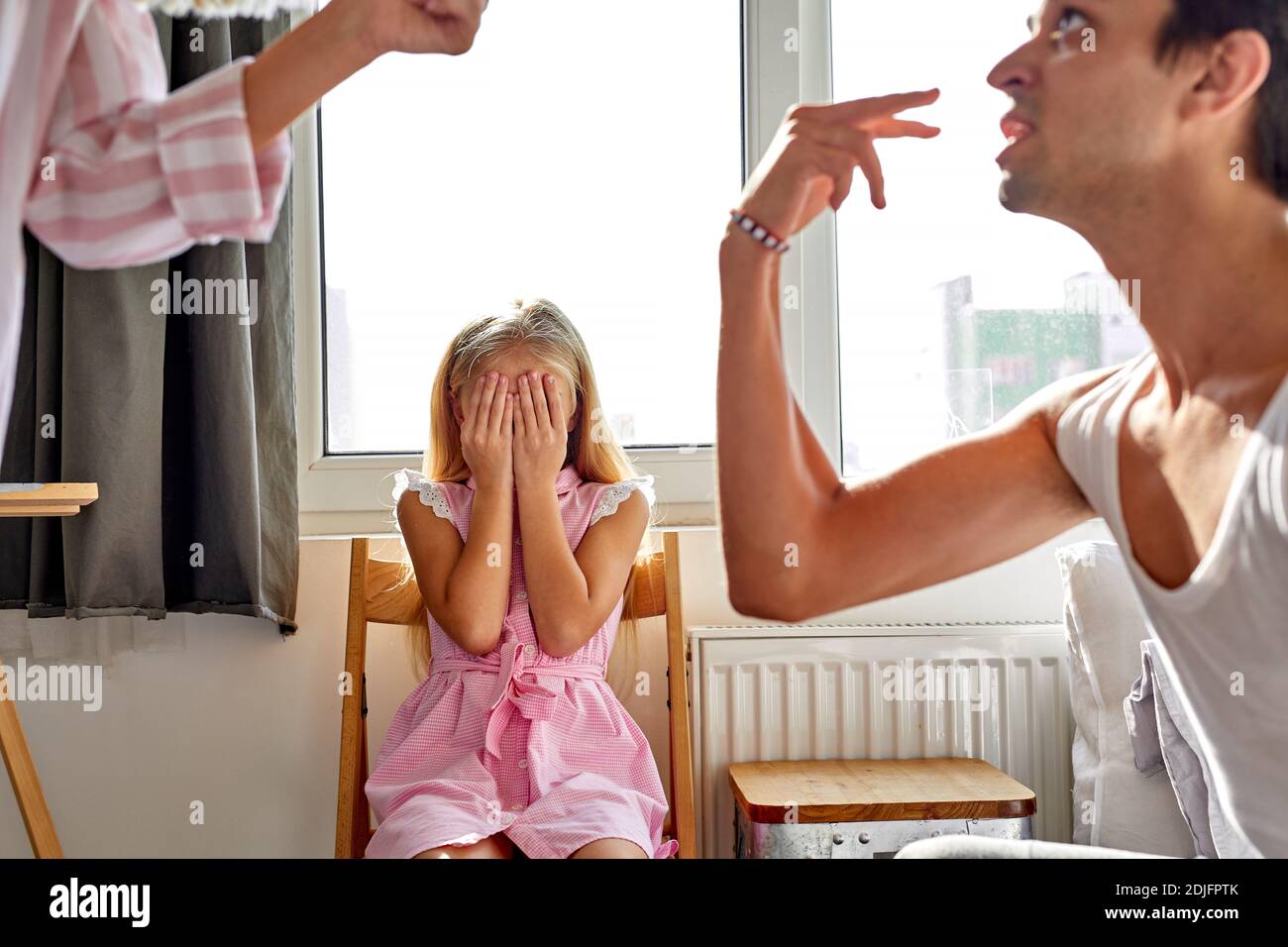 https://c8.alamy.com/comp/2DJFPTK/daughter-is-tired-of-family-conflictsdivorce-and-children-concept-little-kid-girl-sit-upset-with-quarrelling-of-parents-they-are-going-to-be-divorc-2DJFPTK.jpg