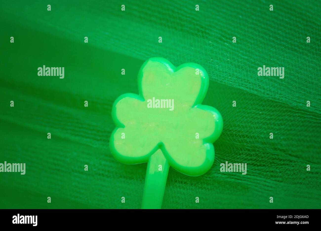 Green Shamrock-is a symbol of the celebration of St. Patrick's Day.  Stock Photo