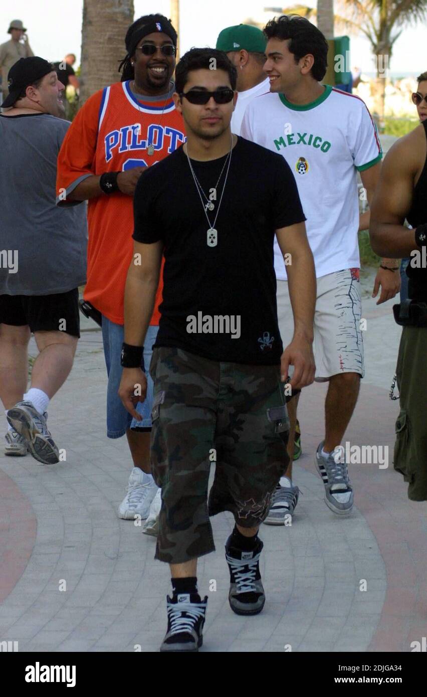 Wilmer Valderrama and his posse strutt the boardwalk on Miami Beach, New Years Day,  1/1/06 Stock Photo