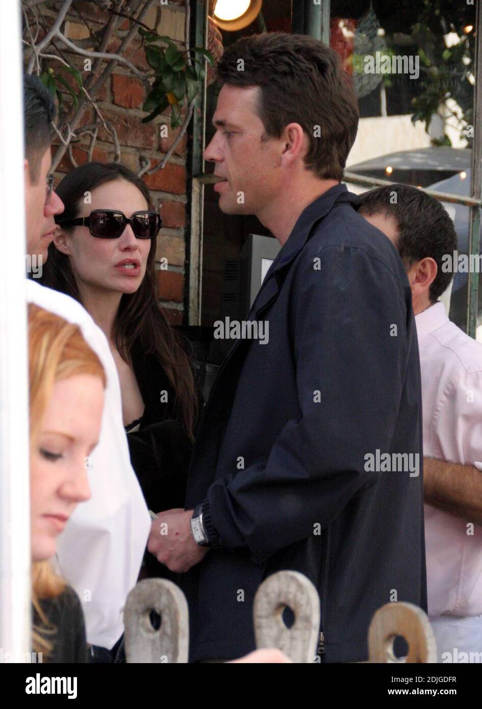 Scottish actor Dougray Scott and girlfriend Claire Forlani are camera shy as leave the Ivy in Los Angeles, Ca. In a rush to get to the privacy of their waiting car. Scott and his lunch date left the popular restaurant holding hands.3/4/06 Stock Photo