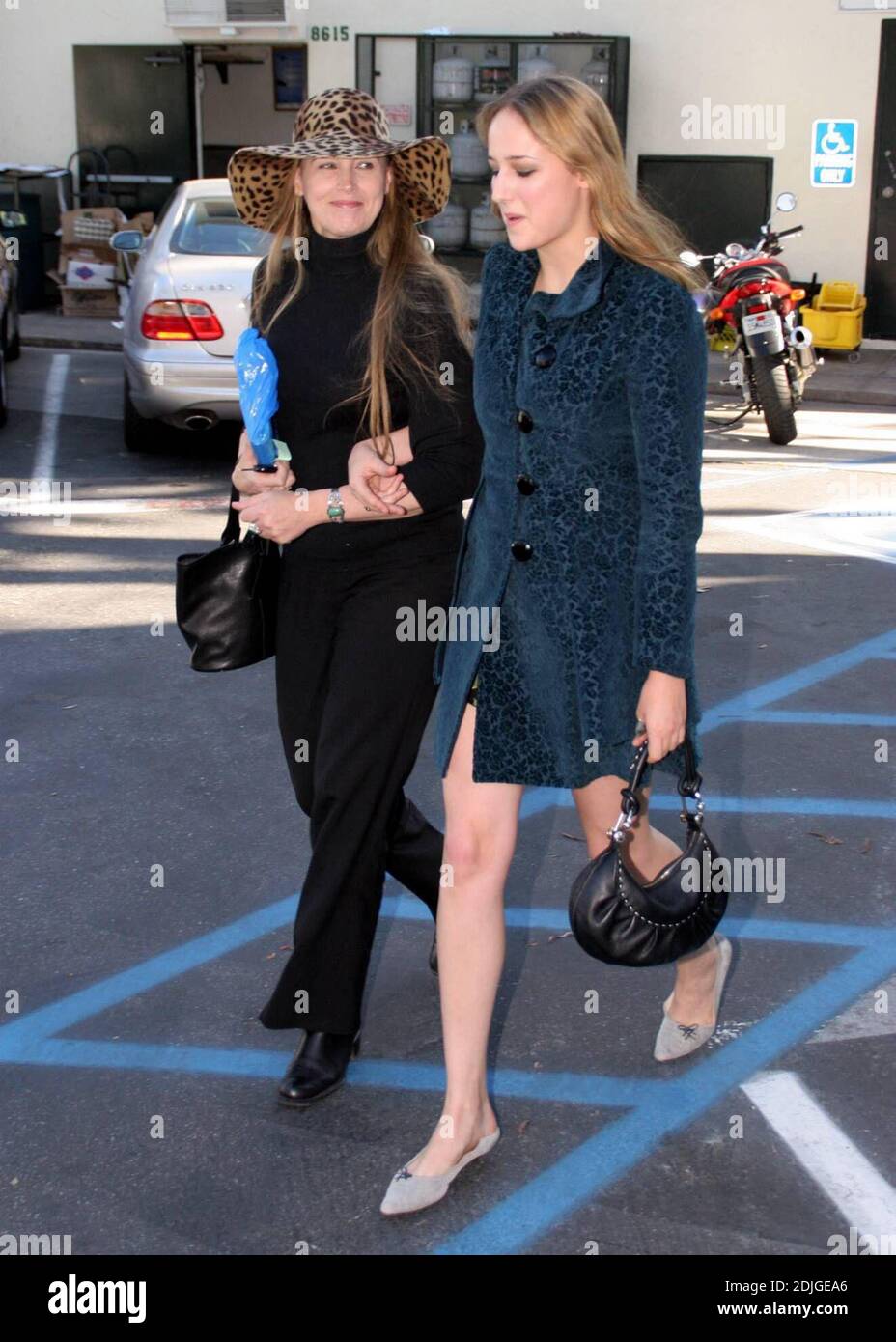 Leelee Sobieski lunches with her look-alike mother Elizabeth at Cafe Med in West Hollywood, Ca. Leelee, who is fluent in French , said  "Bonjour" to the waiting photographers as she headed to her car with her mother, a writer.02/09/06 Stock Photo