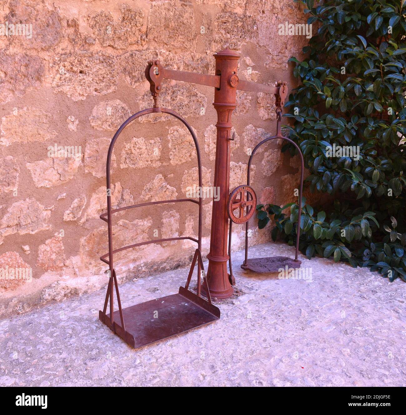 Old iron scale to weigh goods. Castle of Belmonte. Stock Photo