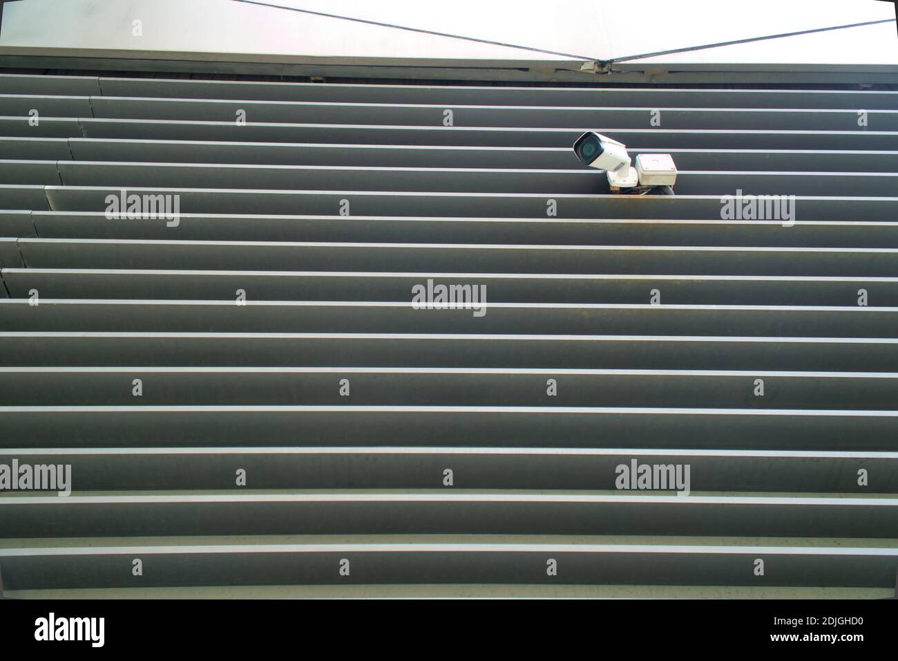 Low Angle View Of Cctv On Wall Stock Photo