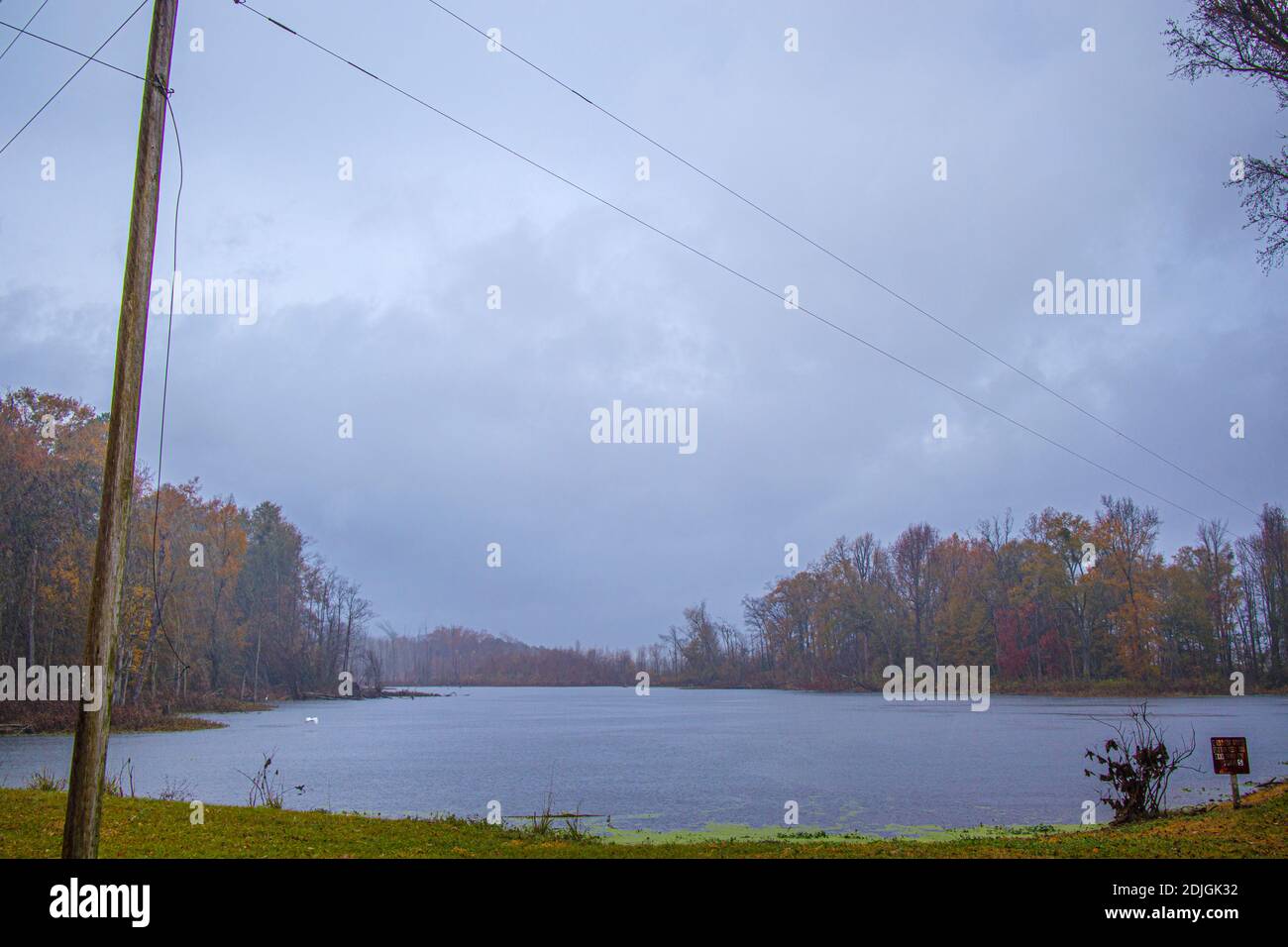 A lake in the Fall in the rain in scene Stock Photo Alamy