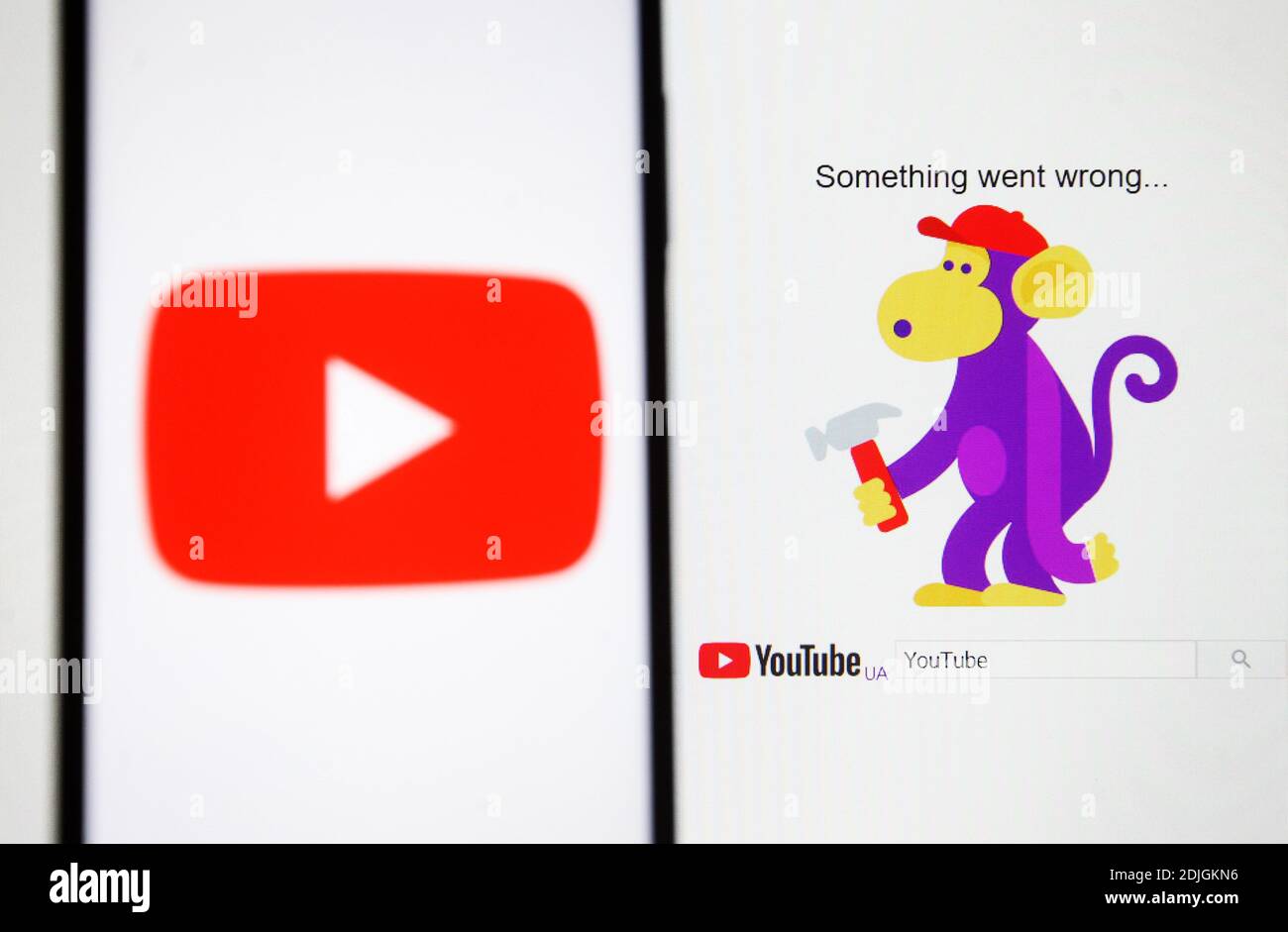 Ukraine. 14th Dec, 2020. In this photo illustration a Youtube logo seen displayed on a smartphone. Users reported about the problem and outage in the youtube app, Users were experiencing a blank page with error messages reading 'something went wrong' accompanied by a monkey holding a hammer in the YouTube video service, but later the issue seems to have been fixed, reportedly by media. The problem mainly affected the European region, as well as the east coast of the United States, Japan, Australia, and Malaysia. Credit: SOPA Images Limited/Alamy Live News Stock Photo