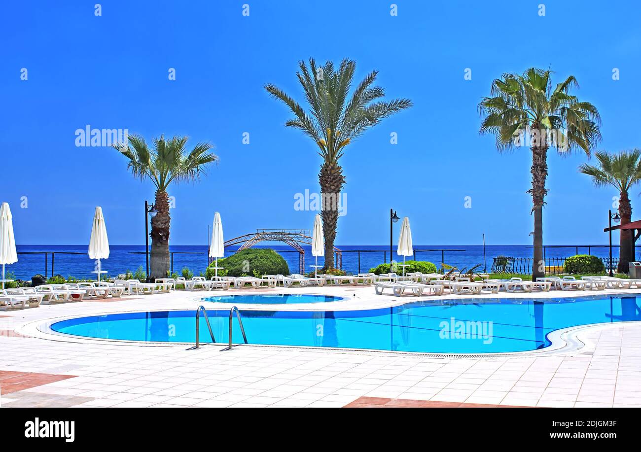 Swimming pool area near Mediterranean Sea in Antalya, Turkey Stock Photo