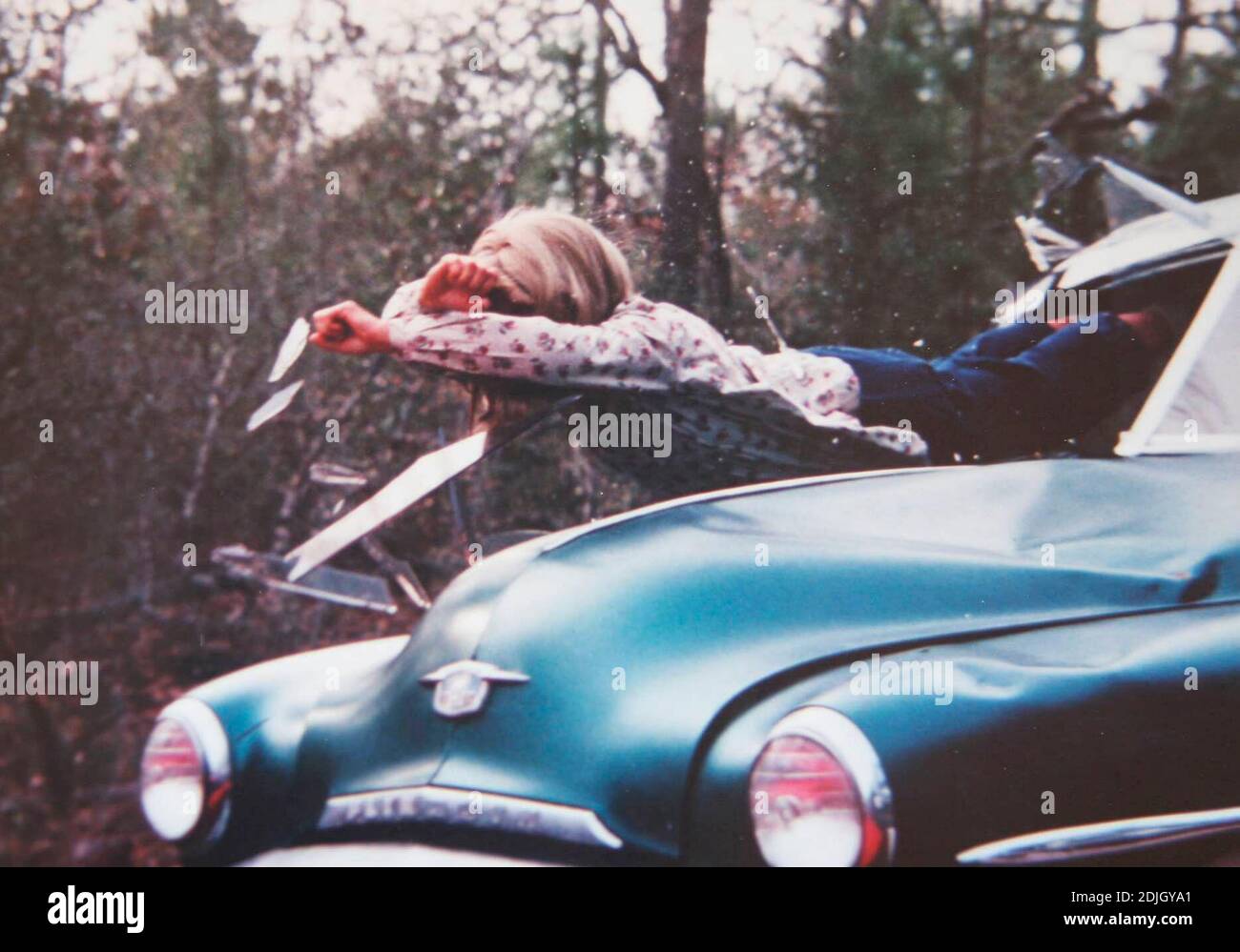 Exclusive!! Michele Waitman flies through the window of a car as she