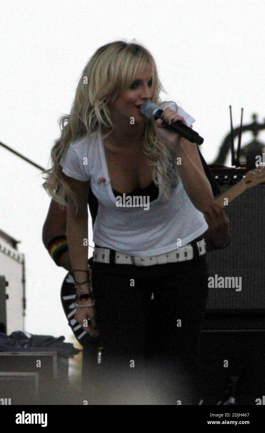Ashlee Simpson performs at Sunfest in Palm Beach FL displaying an obvious change in facial profile amidst roumors of a nosejob. 5/6/06 Stock Photo