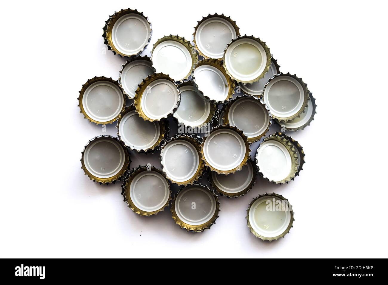 Many soda bottle caps on endless white ground, no alchool yes life, The  word life, consisting of alcohol caps, isolated used glass bottle caps made  Stock Photo - Alamy