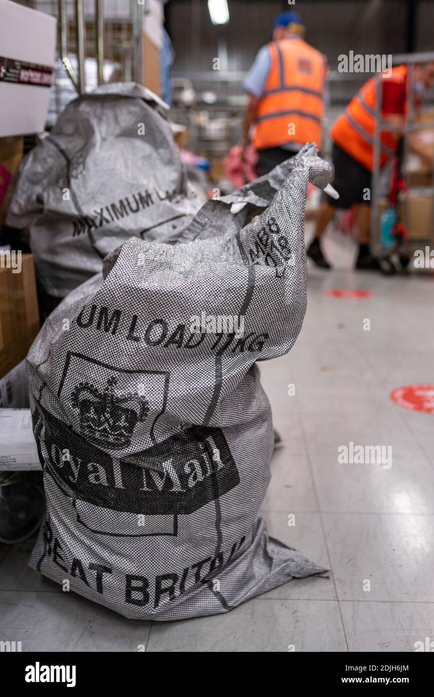 Parcels and letters in Royal Mail postal posting sack, mailing post