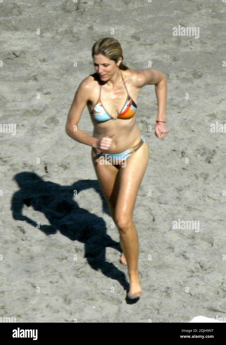 Exclusive!! Marla Maples still looks great at 42. The model/actress and former wife of Donald Trump lunched on Miami Beach while chatting with friends before taking a refreshing dip in the ocean, 4/14/06. Stock Photo