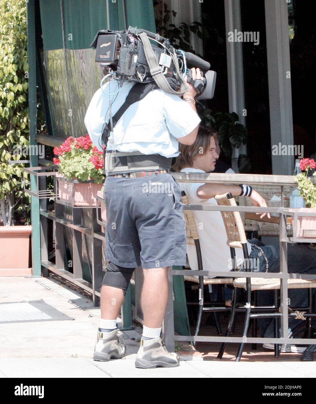 Exclusive!! Sean Stewart  filming  for a pilot show for A&E who are putting together a show that follows showbiz kids Sean Stewart, Randy Spelling,  and budding talent agent Dave Weintraub as they move out of their parents homes and try life as roomies.Ó Cafe Med, West Hollywood, Ca. 4/15/06 Stock Photo