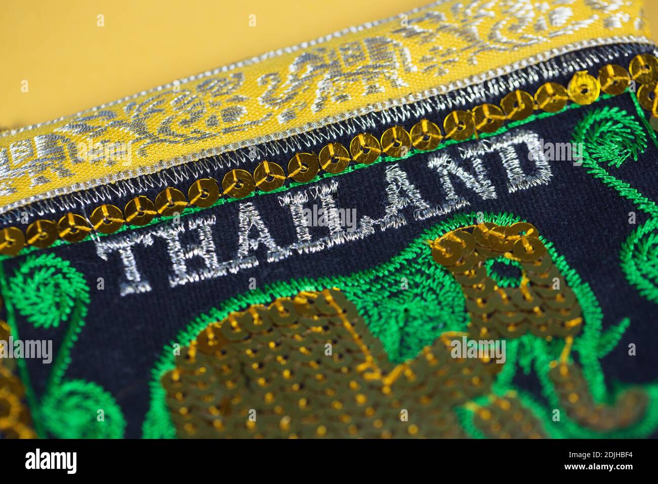 The word "Thailand" on an embroidered coin purse Stock Photo Alamy