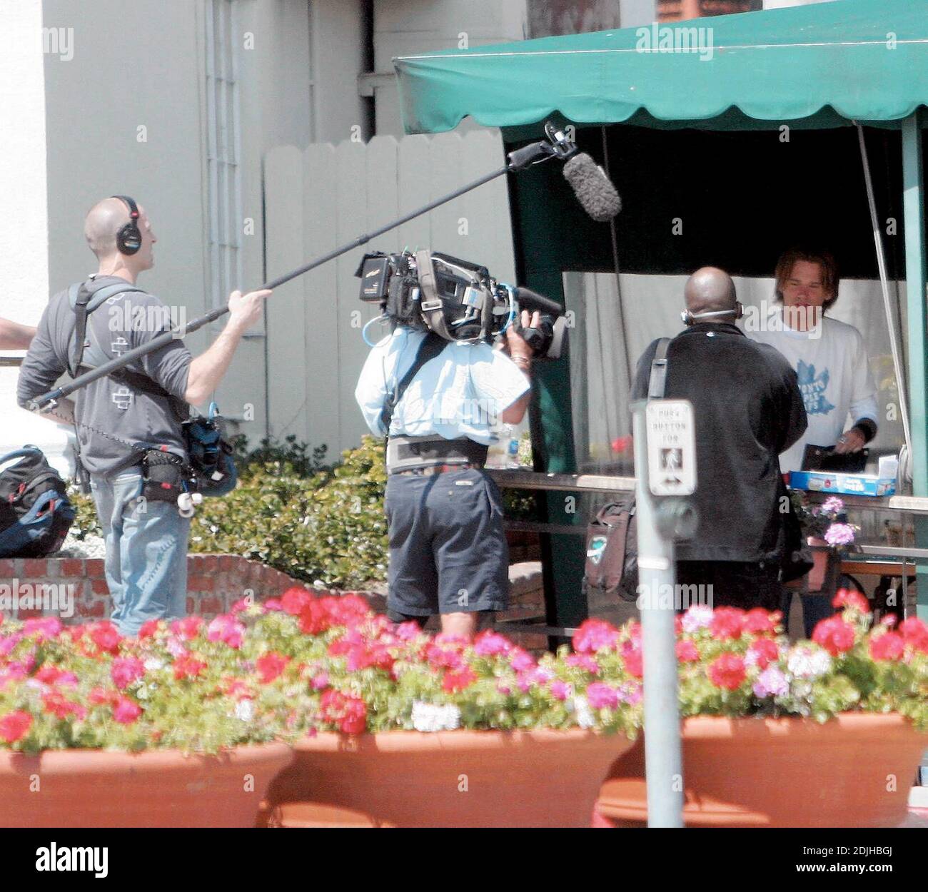 Exclusive!! Sean Stewart  filming  for a pilot show for A&E who are putting together a show that follows showbiz kids Sean Stewart, Randy Spelling,  and budding talent agent Dave Weintraub as they move out of their parents homes and try life as roomies.Ó Cafe Med, West Hollywood, Ca. 4/15/06 Stock Photo