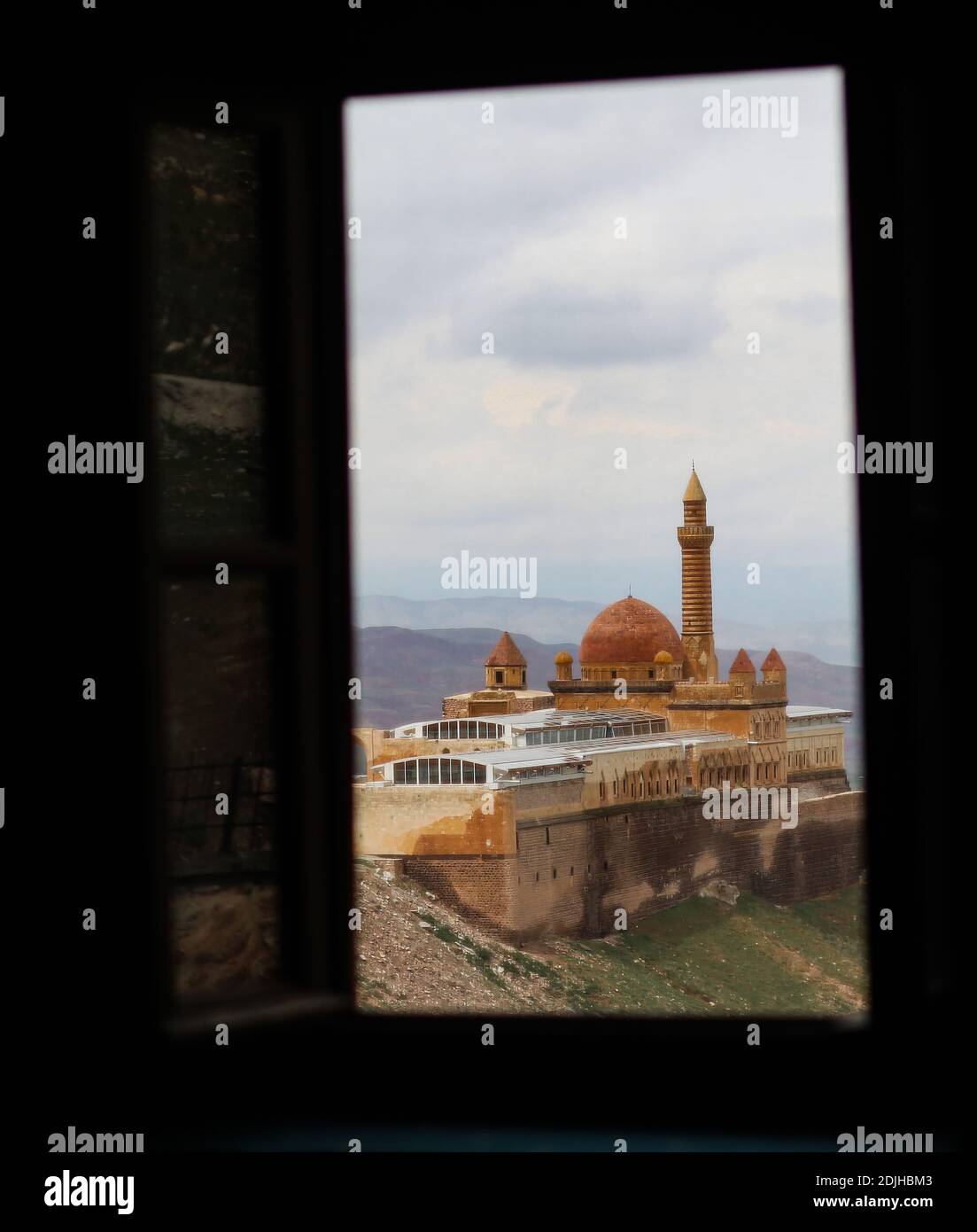 Agri, Turkey - May 2018: The minaret of Ishak Pasha Palace near Dogubayazit in Eastern Turkey. Beautiful brown mosque in the middle east. Different vi Stock Photo