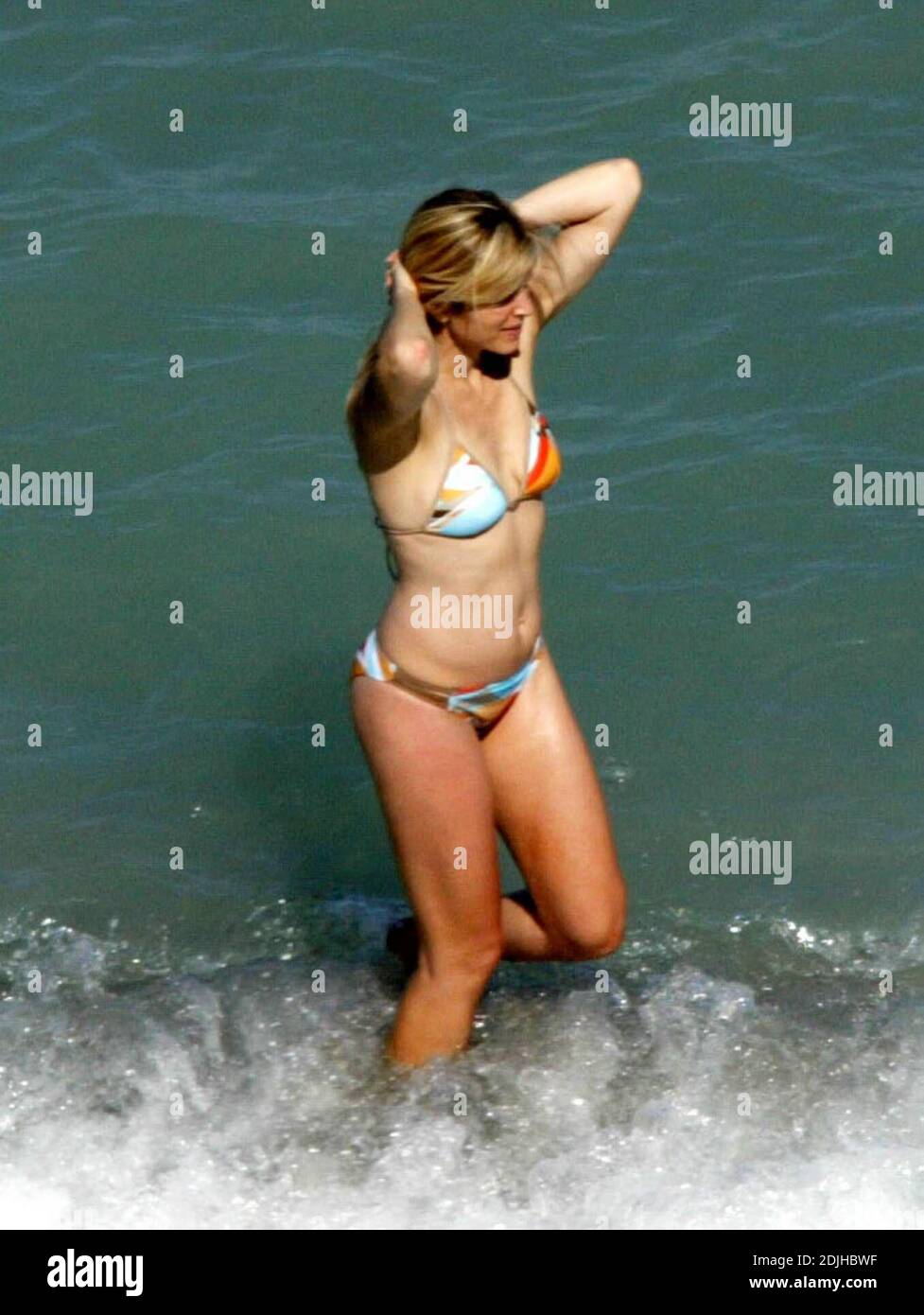 Exclusive!! Marla Maples still looks great at 42. The model/actress and former wife of Donald Trump lunched on Miami Beach while chatting with friends before taking a refreshing dip in the ocean, 4/14/06. Stock Photo