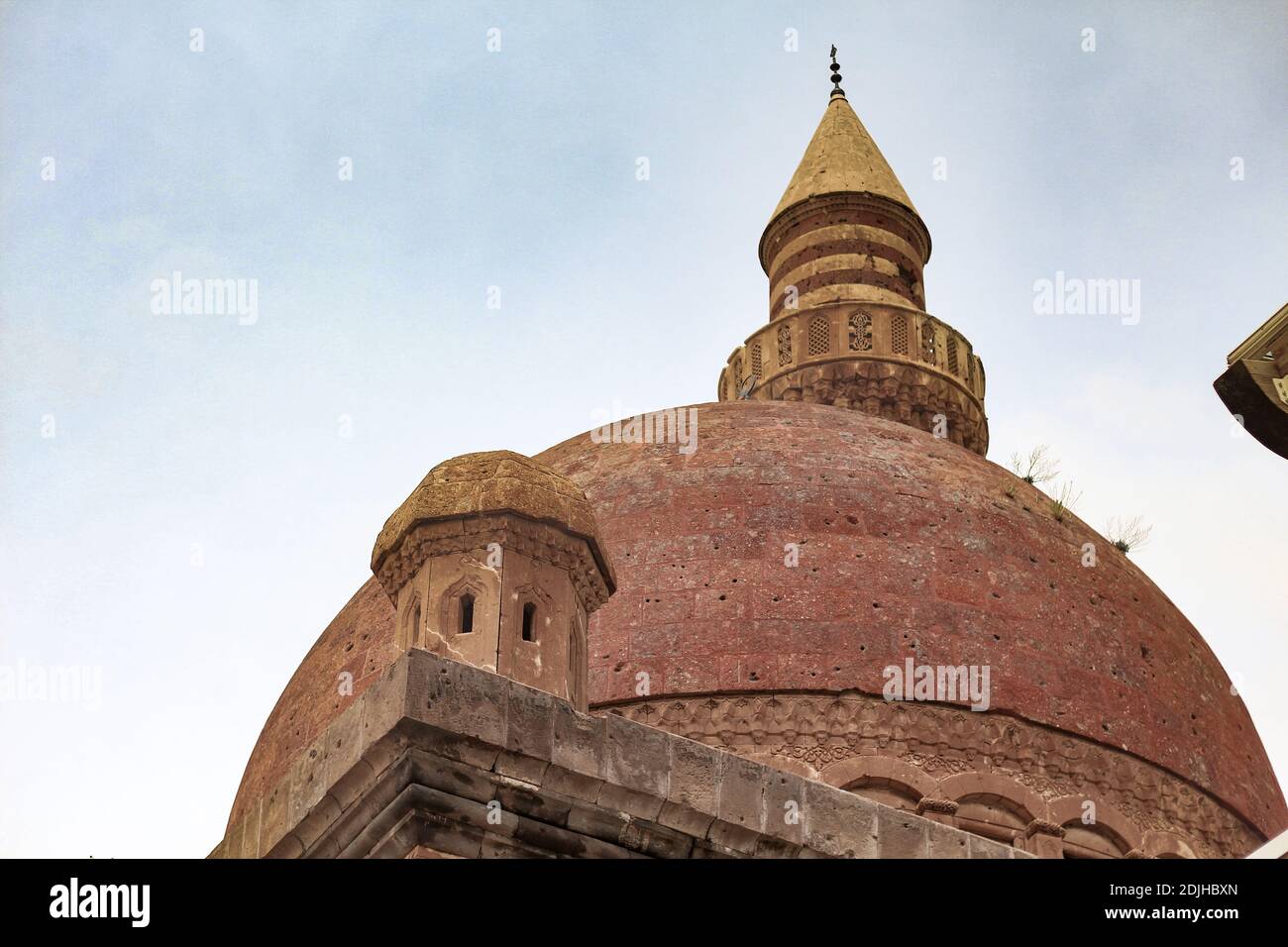 Agri, Turkey - May 2018: The minaret of Ishak Pasha Palace near Dogubayazit in Eastern Turkey. Beautiful brown mosque in the middle east. Different vi Stock Photo