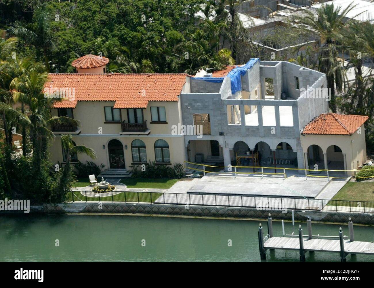 Exclusive!! Alejandro Sanz is having an extension put on his Miami mansion. The roof also still shows signs of damage by last years hurricane, 4/19/06 Stock Photo