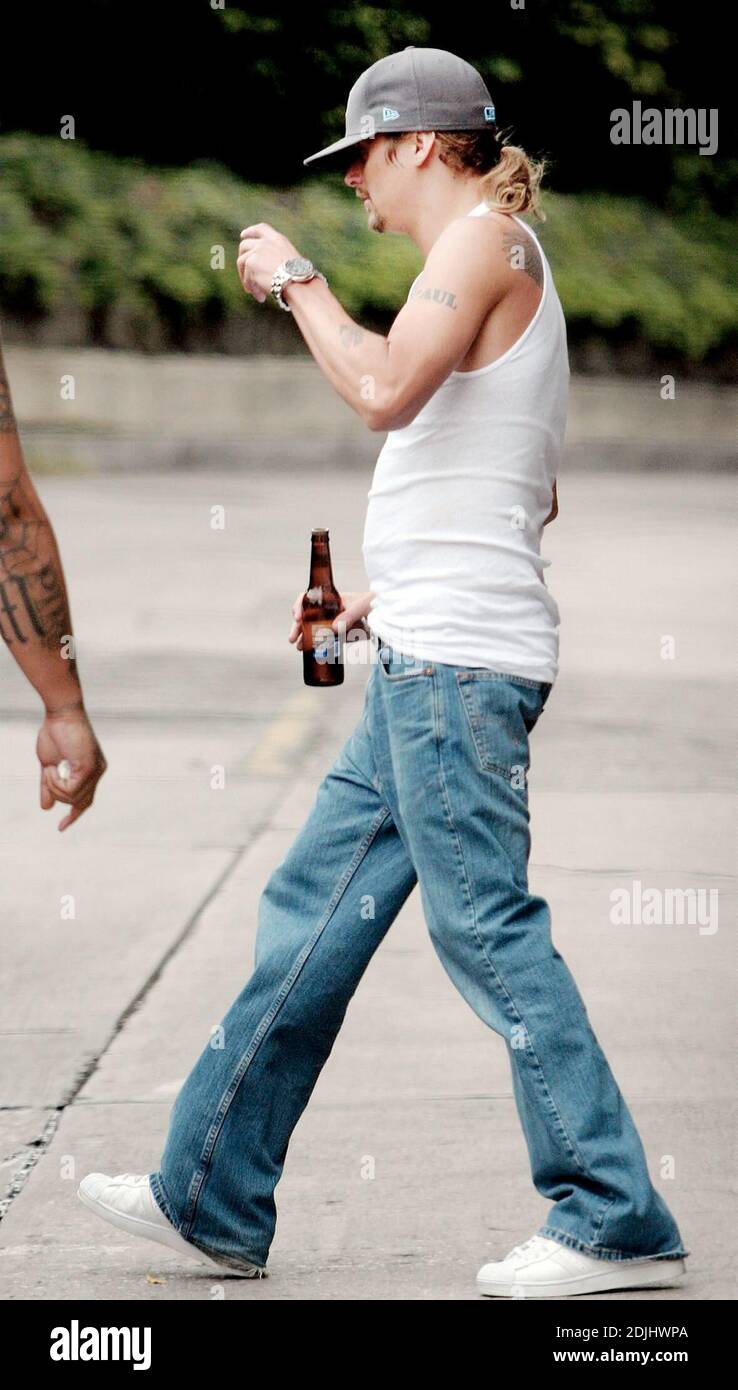 Exclusive!! Kid Rock lives up to his rockstar image by having a beer for breakfast. Then he hopped into a stretch limo that took him to a rehearsals at the Gibson Amiphitheatre at Universal Studios in Studio City, California. 4/28/06 Stock Photo