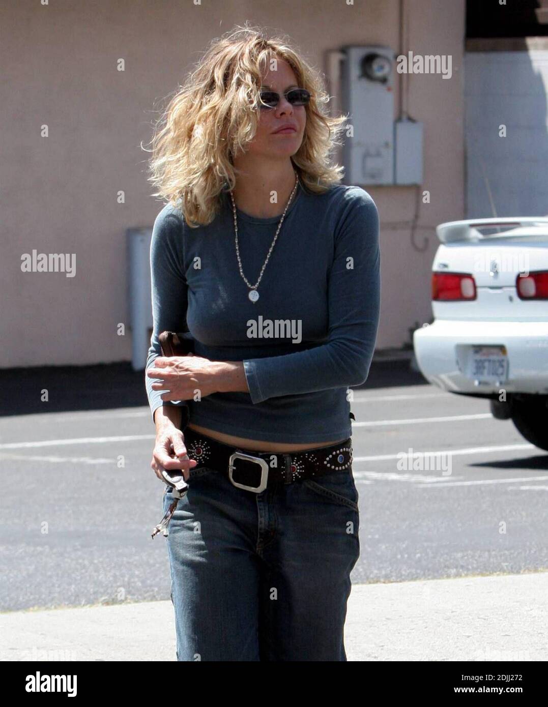 Exclusive!! Actress Meg Ryan checked that her zipper wasn't flying low  during a recently shopping trip in Santa Monica, Ca. 4/11/05 Stock Photo