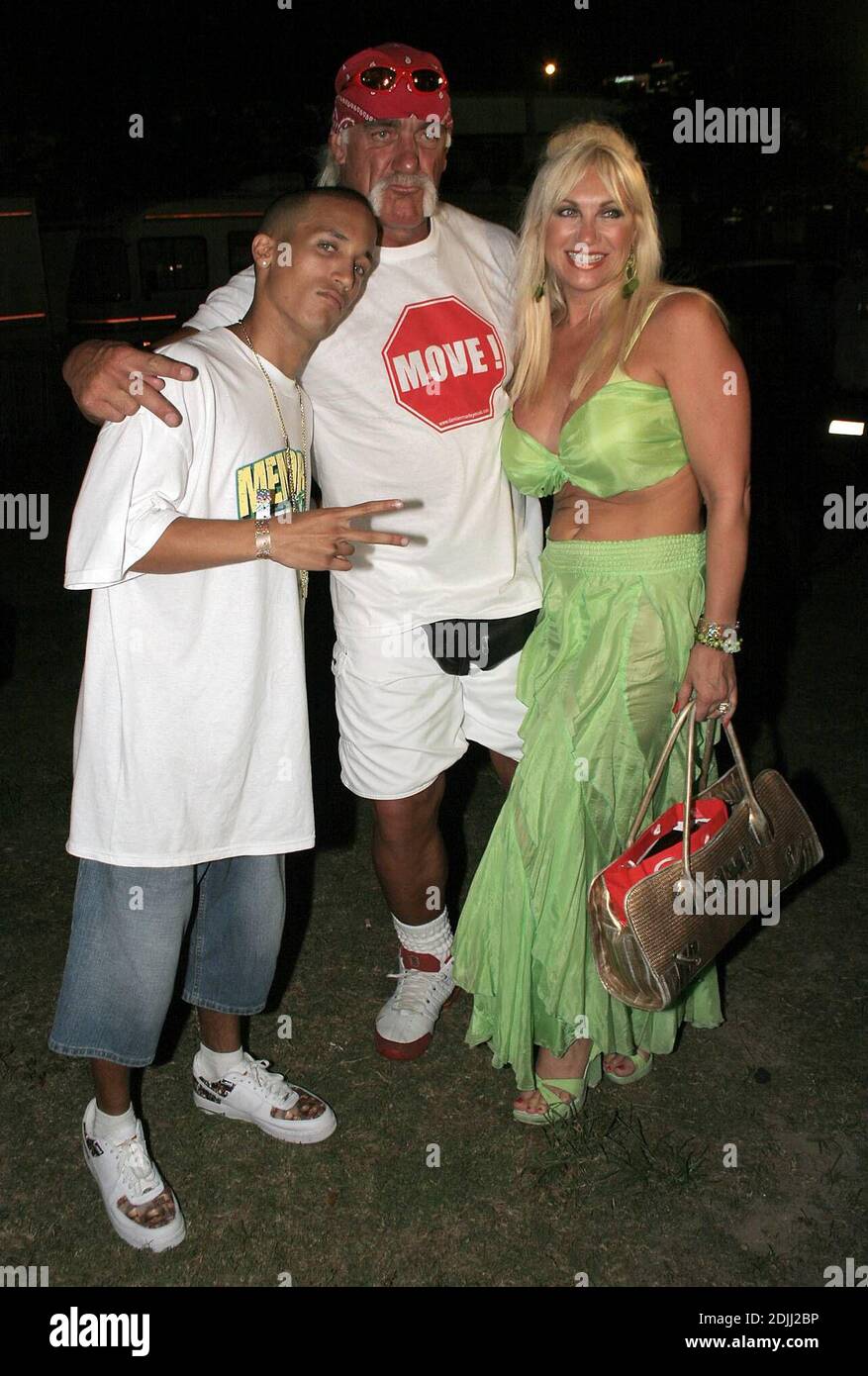 Brooke Hogan performing at Memorial Fest 06. Joining her on stage, rapper  and grill designer Paul Wall, who co-starred in Brooke's new video "About  Us," shot in anticipation of her album debut