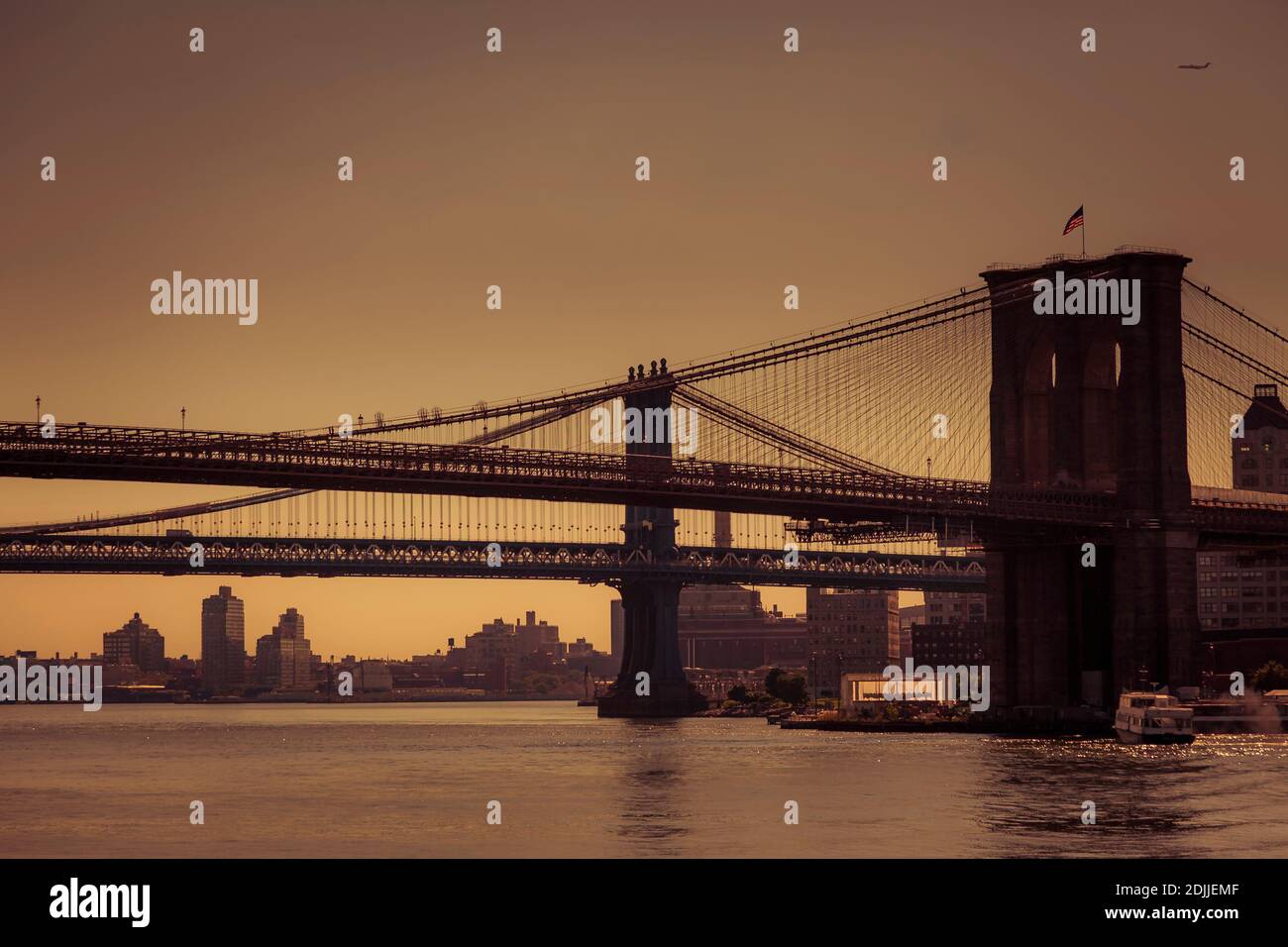 View of the famous Brooklyn bridge in silhouette at dawn Stock Photo ...