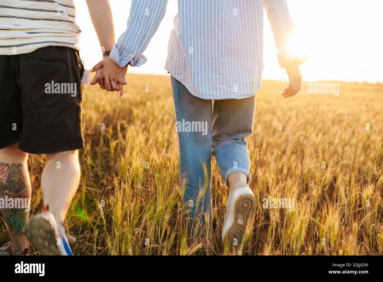 Back view man walking other hi-res stock photography and images - Alamy