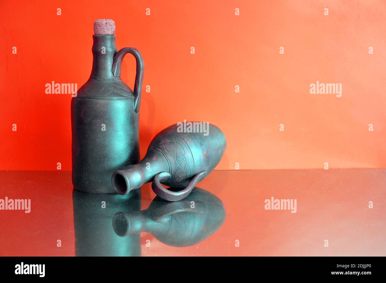 Full and empty clay bottles. Faceting food Stock Photo