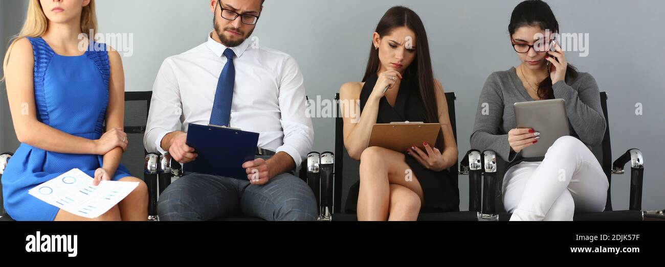 Group of people sitting on chairs during job casting Stock Photo