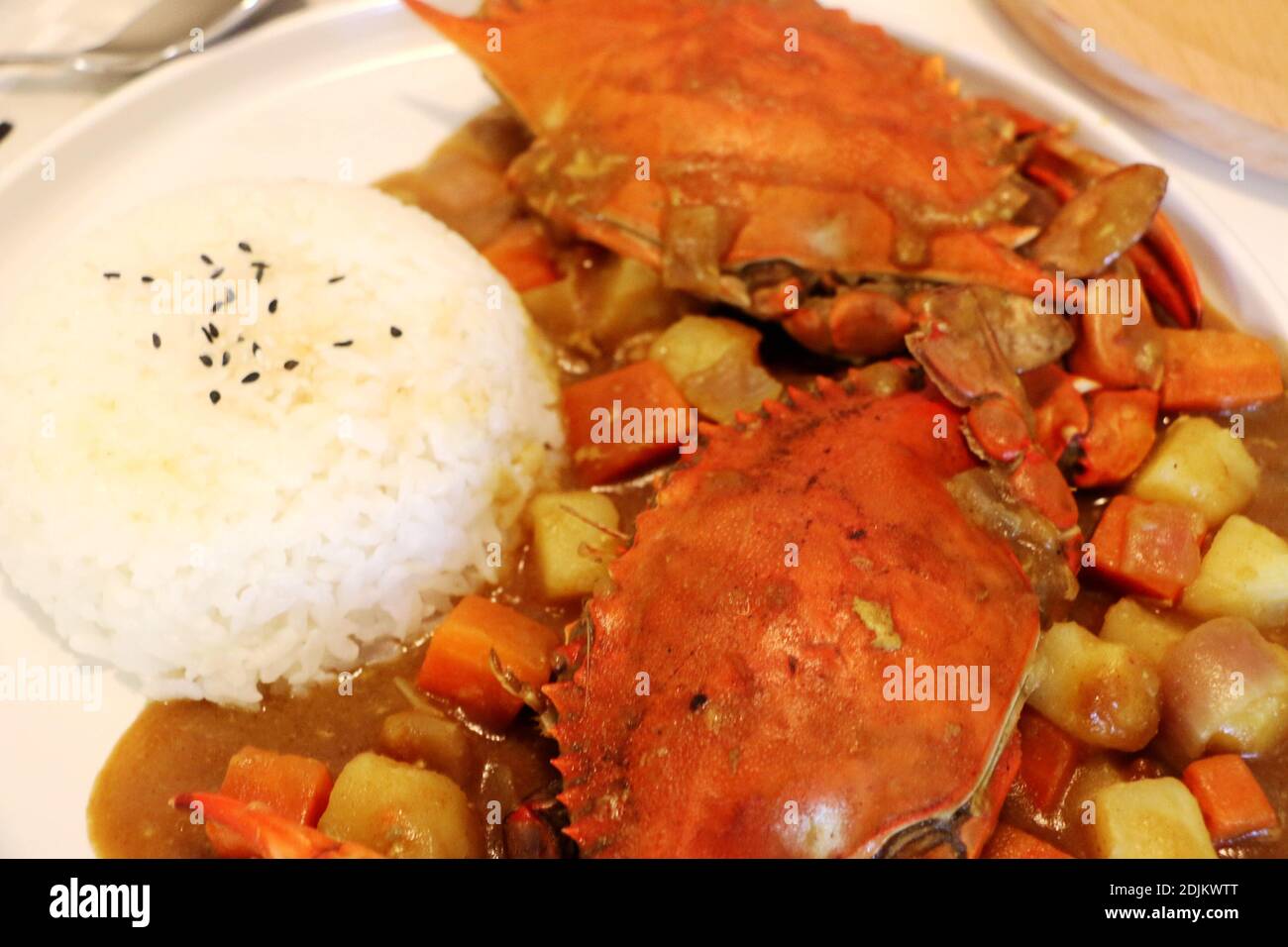 delicious asian style crab rice with vegetables Stock Photo