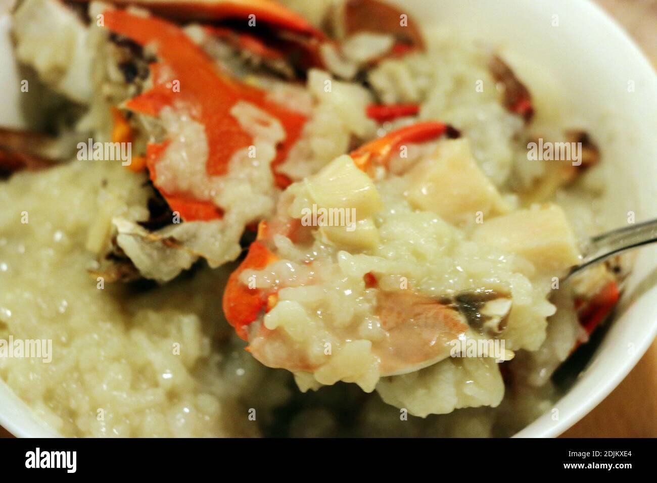 delicious asian style crab rice with vegetables Stock Photo