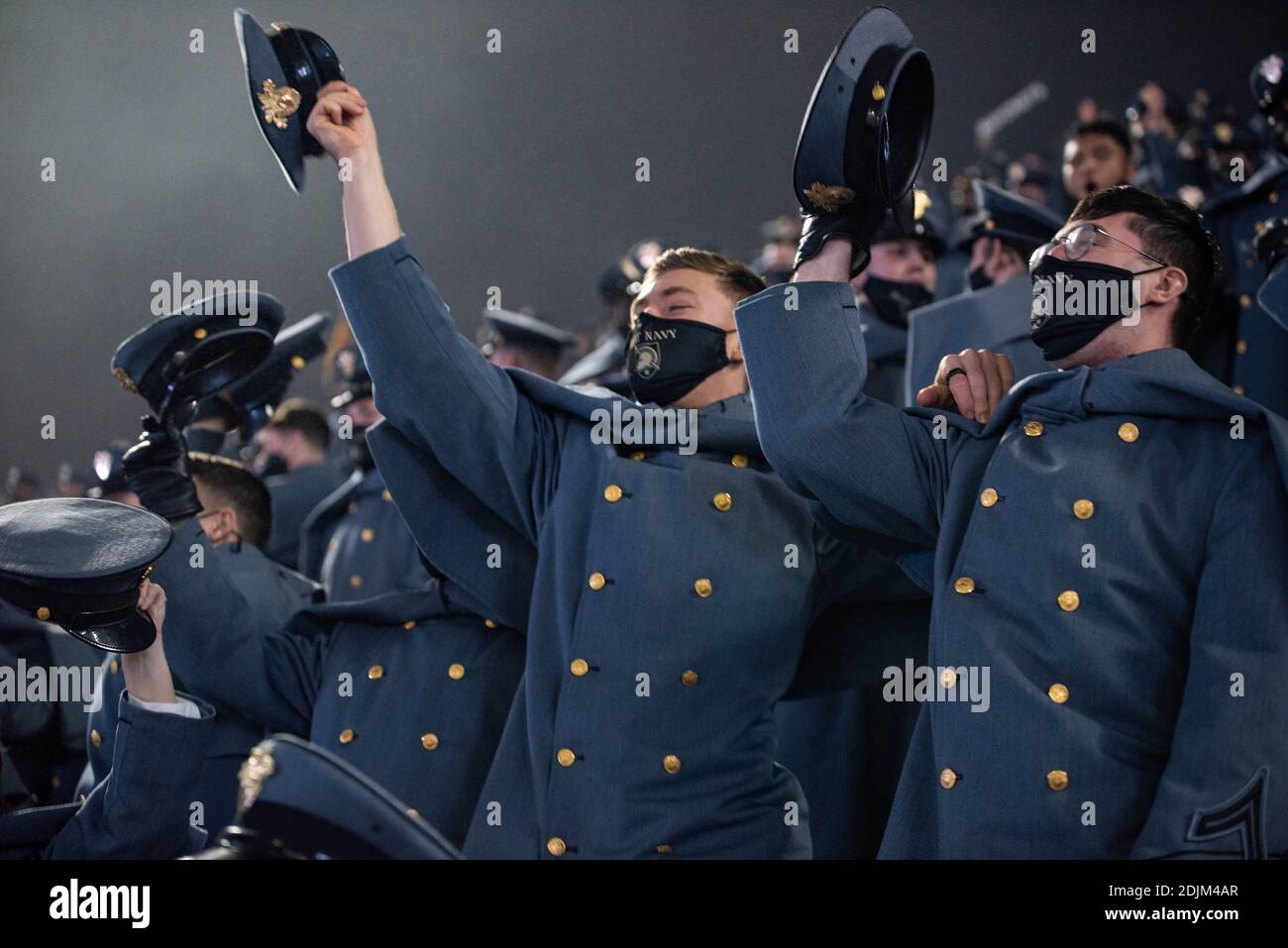 U.S. Navy midshipmen cheer from the stands during the 121st Army-Navy football game at Michie Stadium December 12, 2019 in West Point, New York. The Army Black Knights shutout the Navy Midshipmen 15-0. Stock Photo
