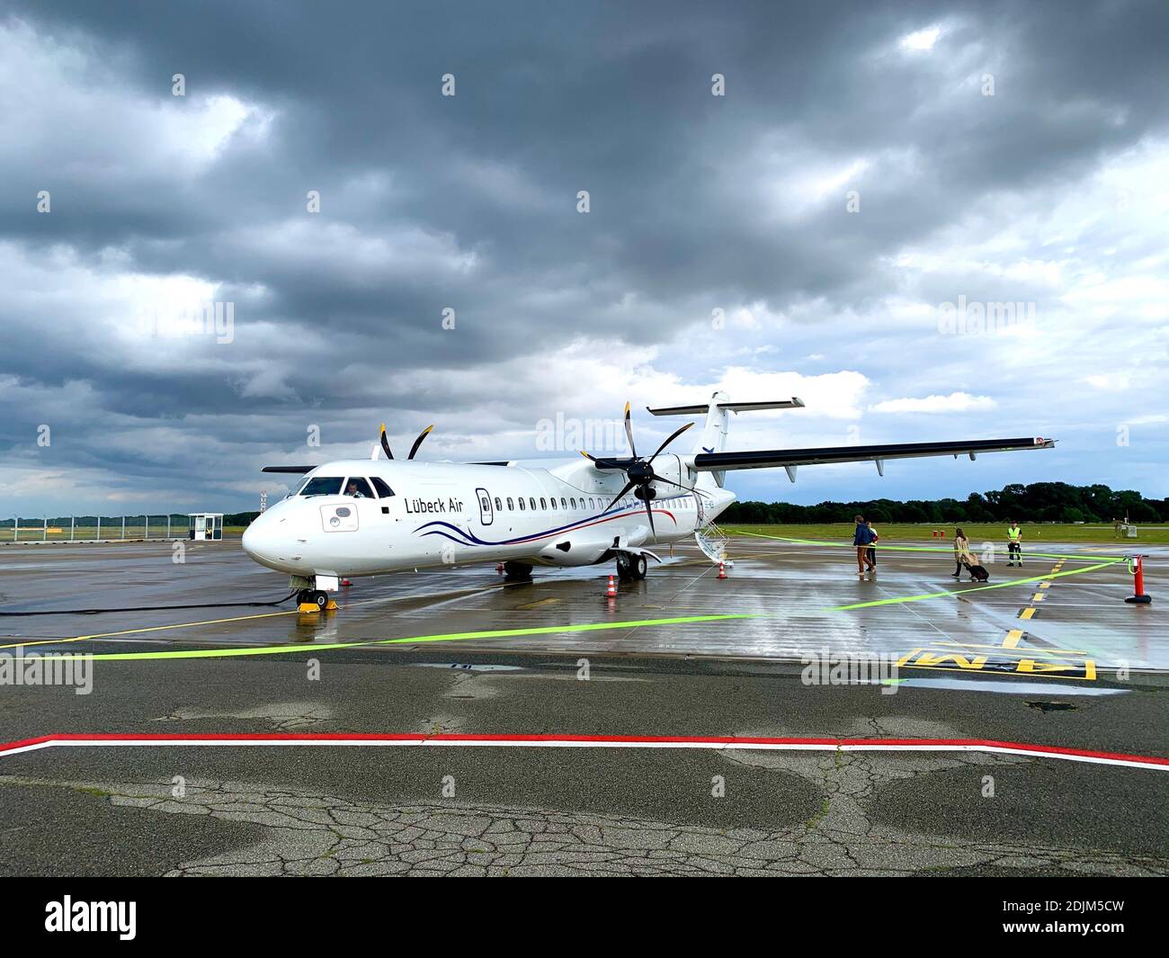 Waiting machine of Lübeck Air on the apron of Lübeck Airport shortly ...