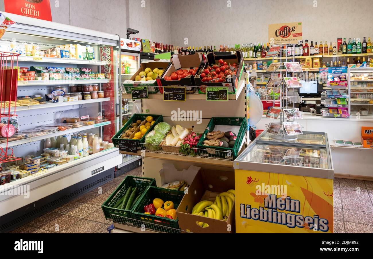 Grocery store, shelves with refrigerated goods and liquor, corner shop Stock Photo